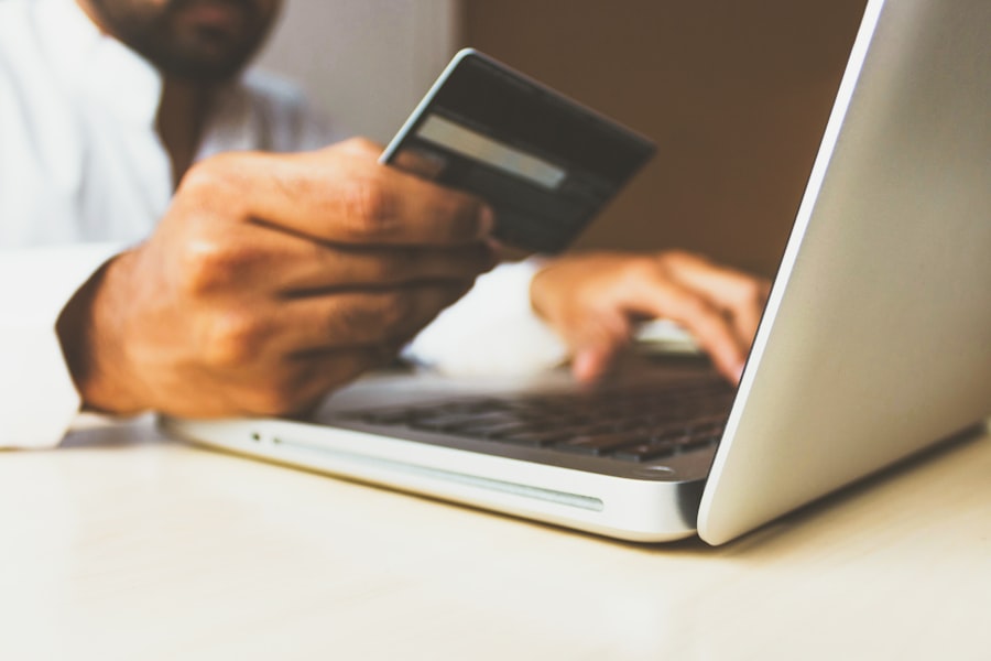 Person making an online purchase on a laptop